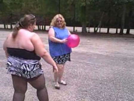 Bbws Playing With Balloons Outdoors - Me and my buddy are playing vollyball with our balloons you get to watch us bounce our fat bodies about as we chase the balloons! Oh what bouncy fun!