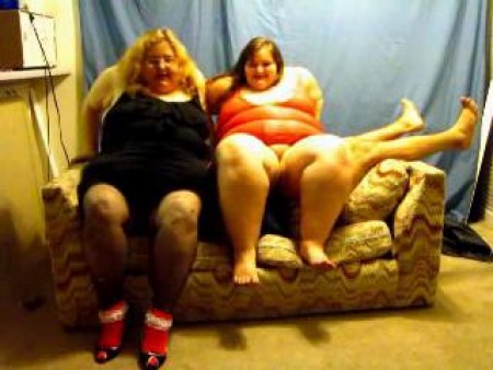 2 Fat Bitches Use Him As A Couch - Yes they sit on him and just use him as their human couch! They sit on him, smother him, smash their fat asses on him, bounce on him, then shake him like a rag doll ! He doesnt stand a chance with these 2 fat bitches!