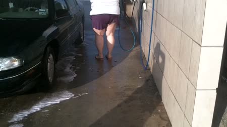 Naughty Nurse Vicki Washes The Car Flashing