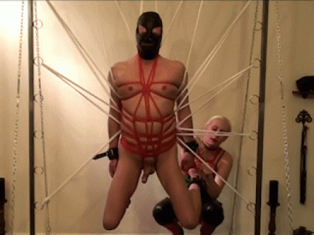 The Spiders Web  Part 1 - The slave already has a body bondage and mrs. Tess ties him up in her spider web. When he is  in her web there is nothing he can do any more !! And mrs. Tess starts playing with him .