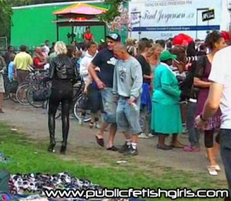 At The Carnival - Katrina followed up her recent outing at the park during carnival celebrations. She attracted many double takes walking through the event in her stunning thigh high latex boots and leather jacket. Check her out