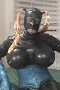 Rubber Tits - Playing in her demask catsuit gets verri really hot (as usual) and she rubs her latex until she needs to stroke her hard she cock. This results in streams of thick cum for the camera.