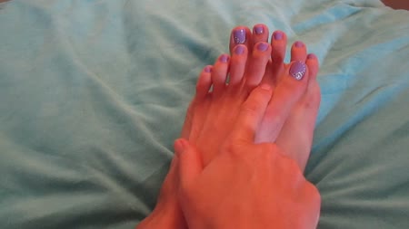 Lotion Feet - Watch marisa as she rubs lotion on her beautiful feet and soles.  Her feet are tired from walking around barefoot all day and she gets the soles super soft and her toes super pretty.