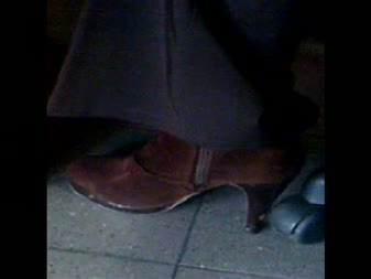 Office  Brown Boots Ankle Style - An office **** that work in the same company that I work. She usually wear very nice shoes and boot. So decided to catch cam. 
in this clip I was sitting next to her in her office to discuss, I used my mobile cam to record her boots.