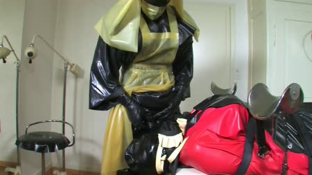 Rubber Leila Media - Bizarre Rubber Apron Bondage Part 5 Of 5 Rubber Leila Media - Bizarre Rubber Apron Bondage Part 5 Of 5