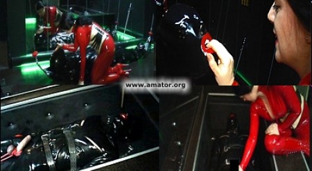 The Plexiglass Box Part 1 - Lady isis continues to educate her rubber object.The slave is freed from his rubber cocoon for one reason only: to be relocated into the bondage box.But first he's equipped with a special rubber mask, which covers even the inside of his mouth with latex. Completely unable to speak or move, the rubber puppet is fixated within the bondage box and showcased through a plexiglass pane. An incredible rubber session with lady isis.