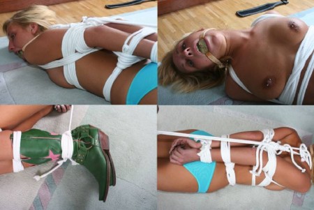 Tight Hogtied - Topless **** nikki is hogtied very tight, ballgagged, lying on the floor....